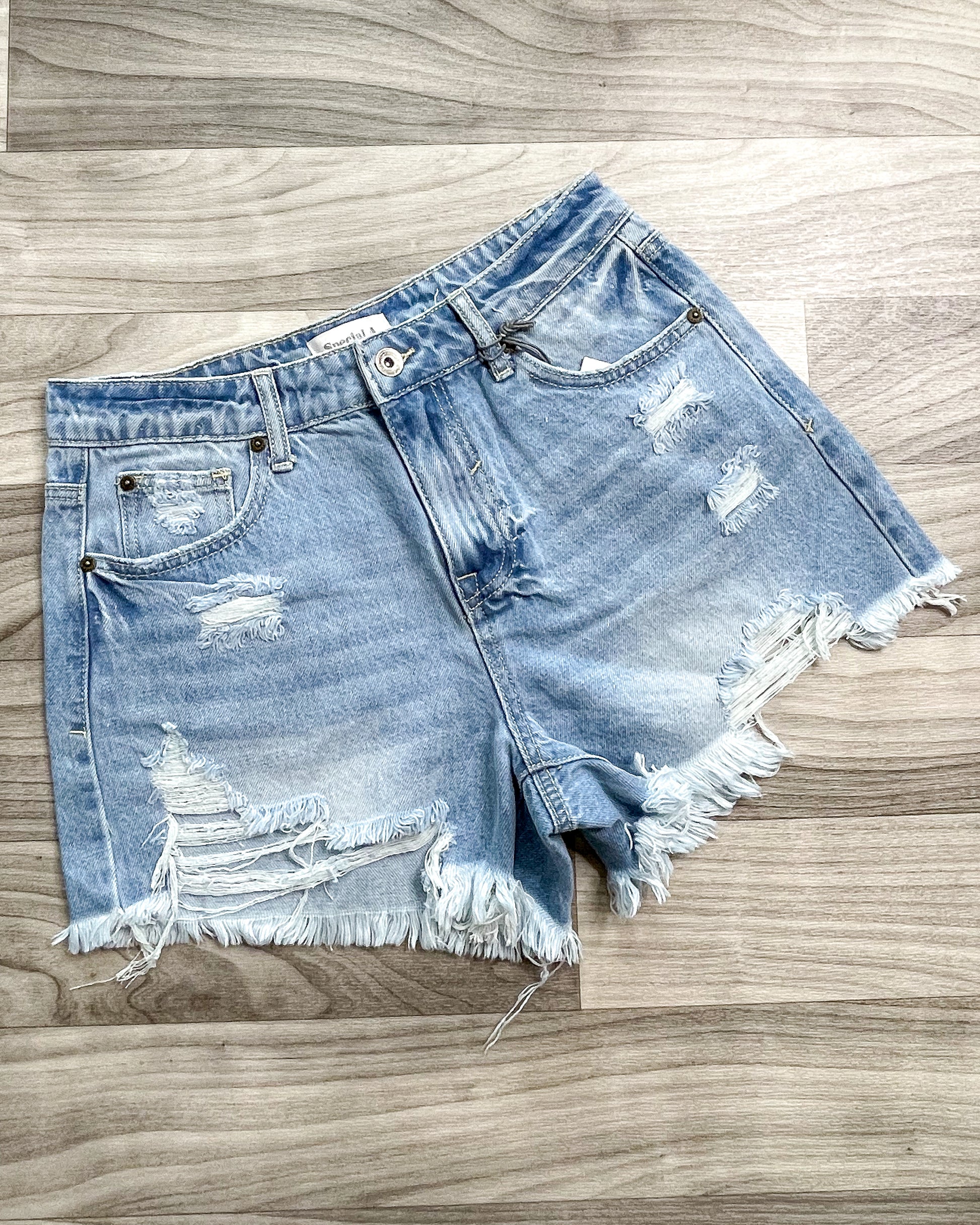 High Rise Distressed Shorts.