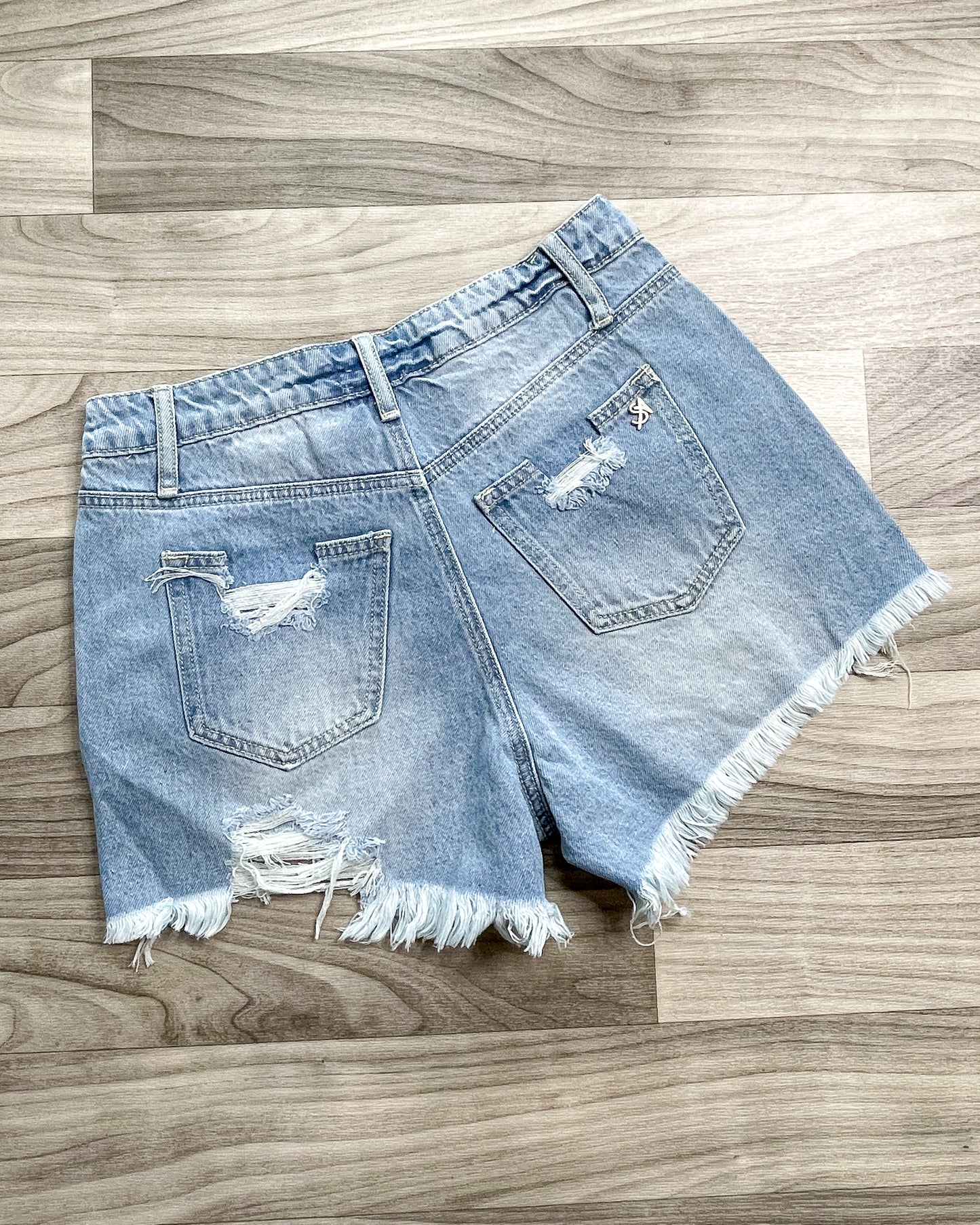 High Rise Distressed Shorts.